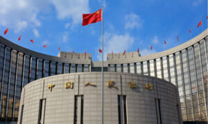 China’s Central Bank Cuts Reserve Ratio to Boost Economic Recovery