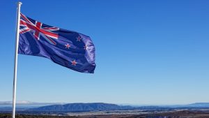 New Zealand central bank sees less growth, FOMC says it will remain cautious, Trump tariffs upended