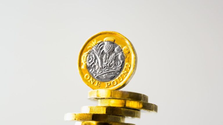 Pound steady as UK inflation surges
